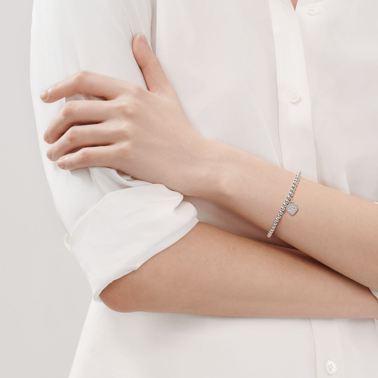 Return to Tiffany®:Pink Mini Heart Bead Bracelet in Silver with a