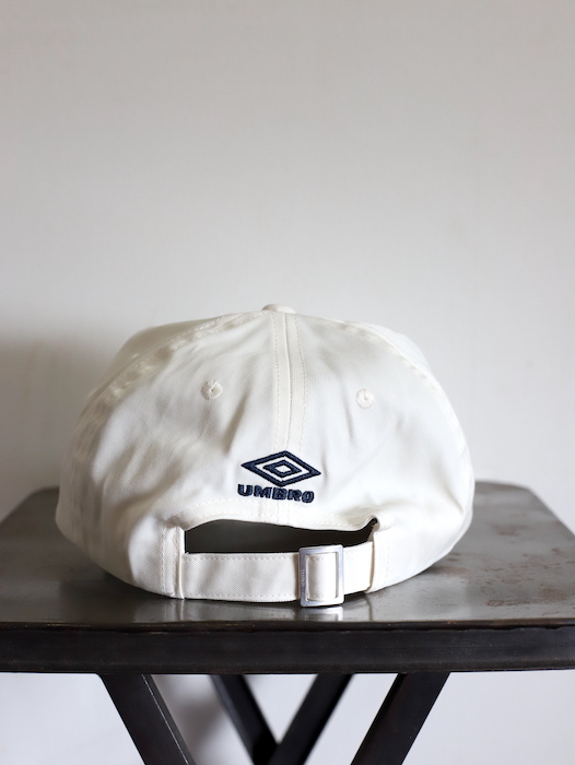ssstein × UMBRO ] WATER REPELLENT CAP IVORY - spares
