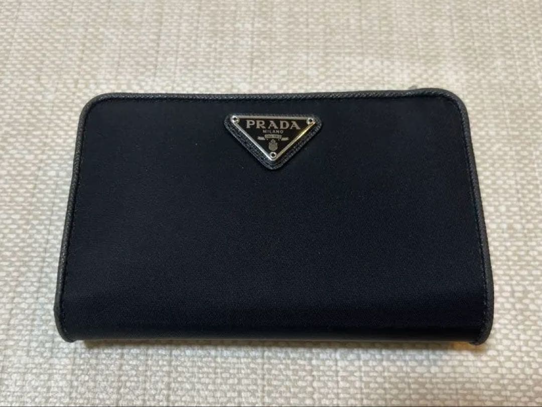 PRADA】プラダ 1ML225 サフィアーノ 二つ折り財布 ナイロン 黒 - メルカリ