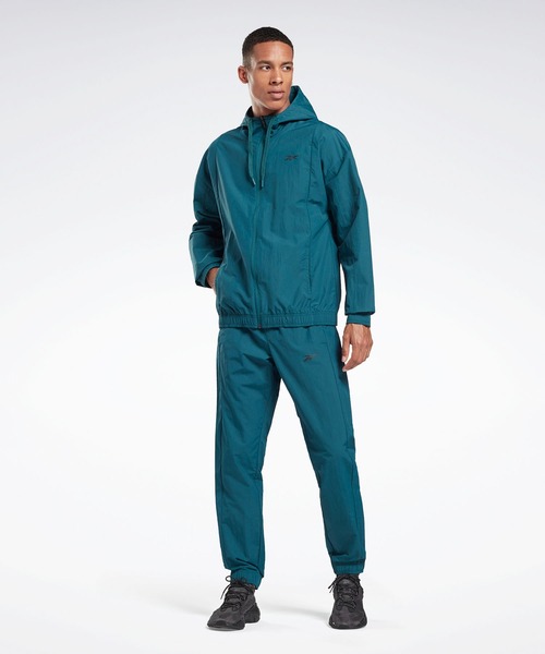 Reebok（リーボック）の「テックスタイル トラックスーツ / Techstyle